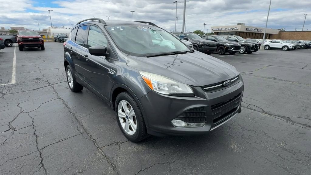 Used 2016 Ford Escape SE with VIN 1FMCU0GX9GUC24385 for sale in Center Line, MI